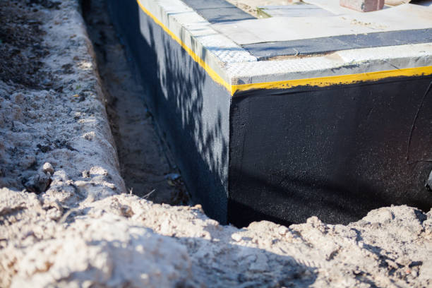 Professional Waterproofing technician working in Avon, MN